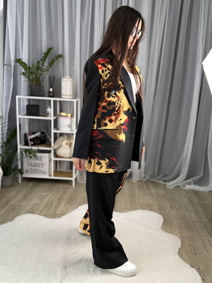 Women’s trouser suit, black with leopard print